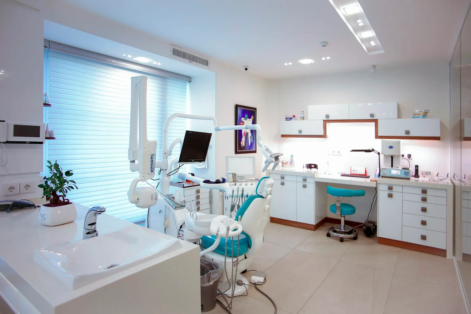 Bright clinic reception area with seating and a clear information desk